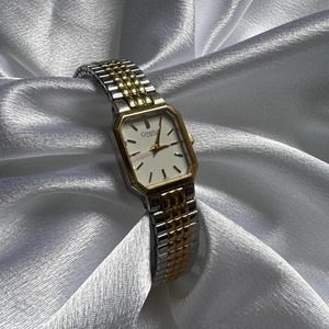 Vintage Caravelle by Bulova ladies two tone classic dainty tank watch